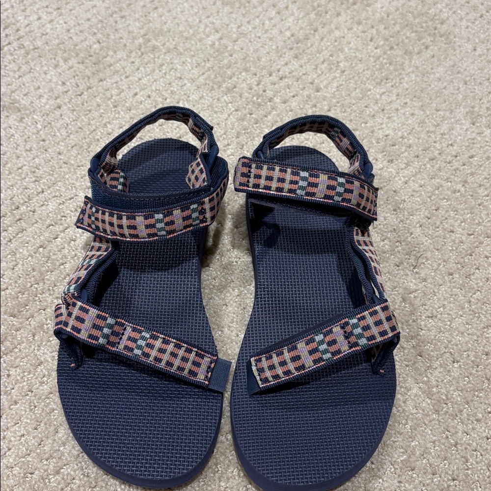 Navy Blue Sandals with Patterned Straps
Teva sandals never worn new